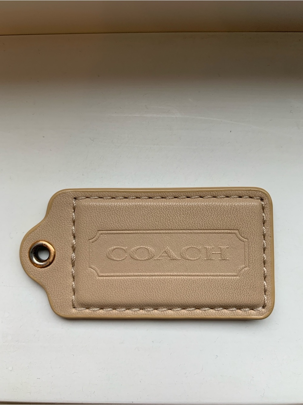 Coach Leather Tag with Embossed Logo Tan Colour